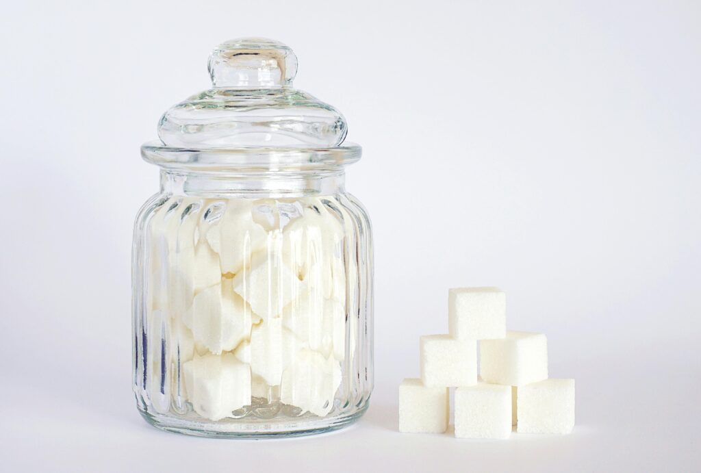 Sugar Substitute For Keto - A glass jar filled with sugar cubes.